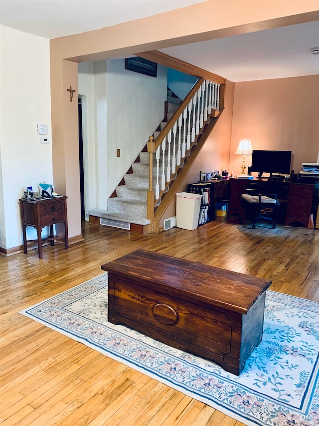 living room with hardwood / wood-style floors