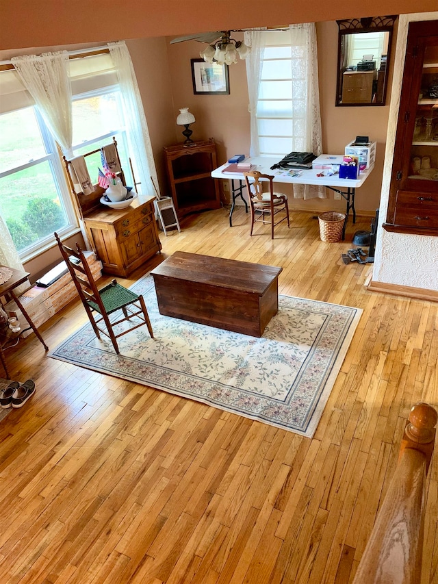 interior space featuring ceiling fan and light hardwood / wood-style floors