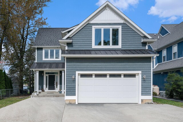 view of front of property featuring a garage