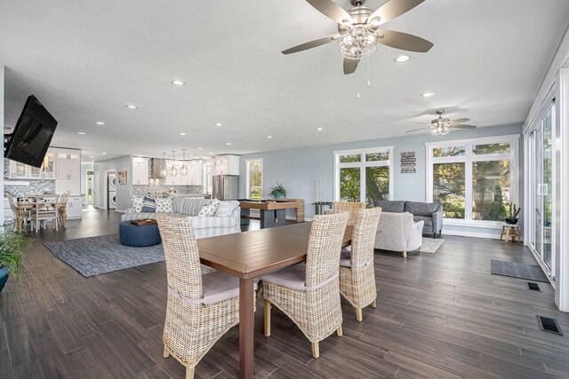 dining area with dark hardwood / wood-style floors, ceiling fan, a textured ceiling, and pool table