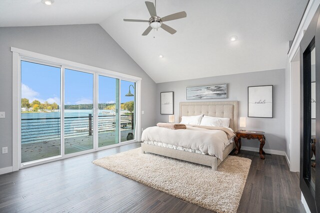 bedroom with ceiling fan, dark hardwood / wood-style flooring, high vaulted ceiling, access to outside, and a water view