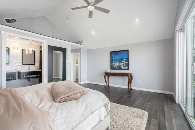 bedroom with dark hardwood / wood-style flooring, vaulted ceiling, ceiling fan, and sink