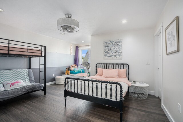 bedroom featuring dark hardwood / wood-style flooring