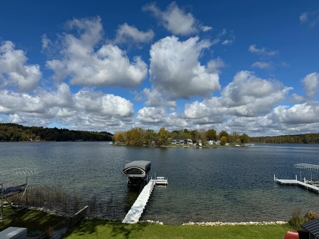 water view featuring a dock