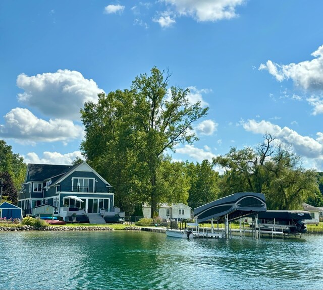 view of water feature with a dock