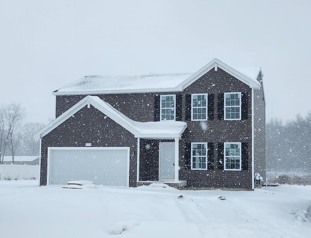 view of front of home with a garage