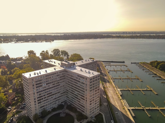 aerial view at dusk with a water view