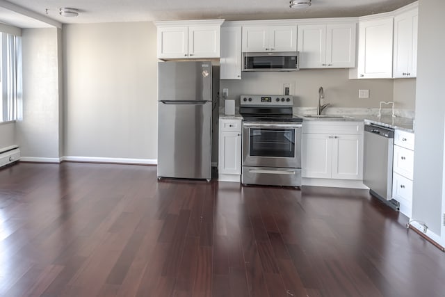 kitchen featuring white cabinetry and stainless steel appliances