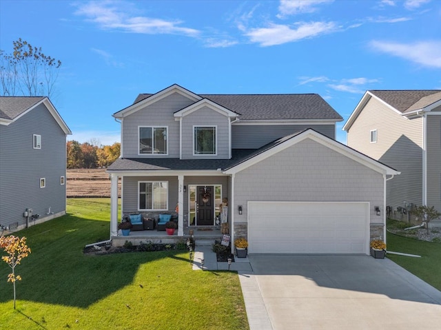 front facade with a porch, a garage, and a front lawn