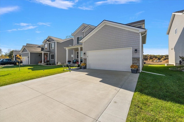 view of front facade featuring a front yard and a garage