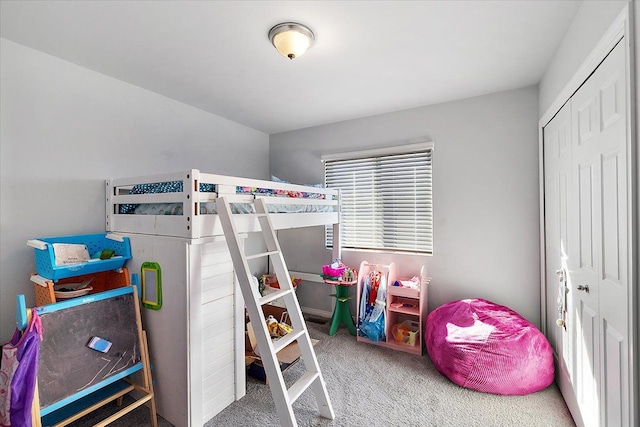 carpeted bedroom with a closet