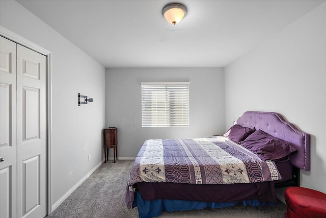 carpeted bedroom featuring a closet