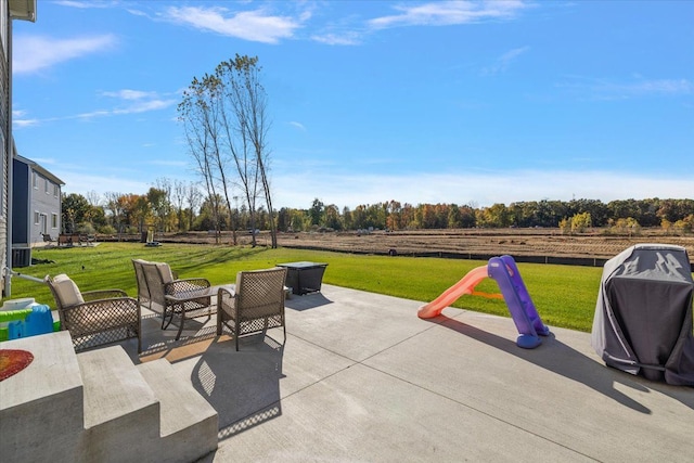 view of patio / terrace featuring a rural view