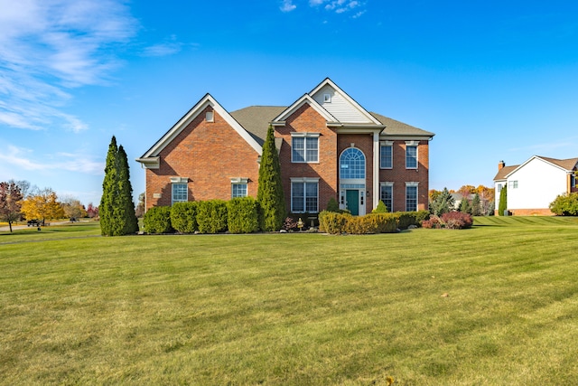 view of front of house with a front lawn