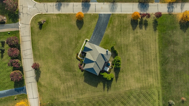 birds eye view of property featuring a rural view