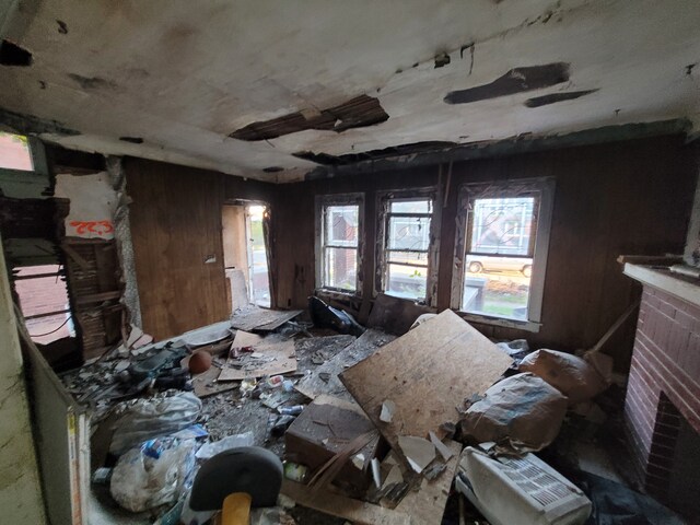 4824 Cortland St, Detroit, MI 48204 - miscellaneous room featuring a fireplace and wooden walls