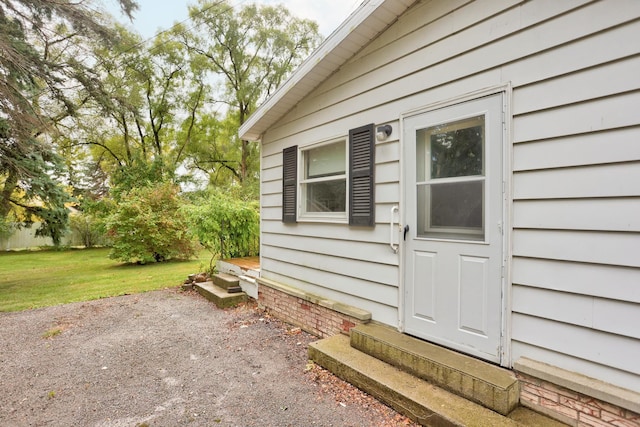 view of property exterior with a lawn