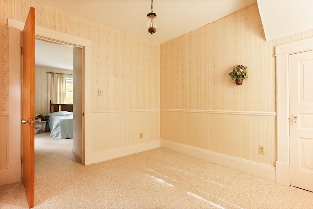 unfurnished room featuring carpet flooring