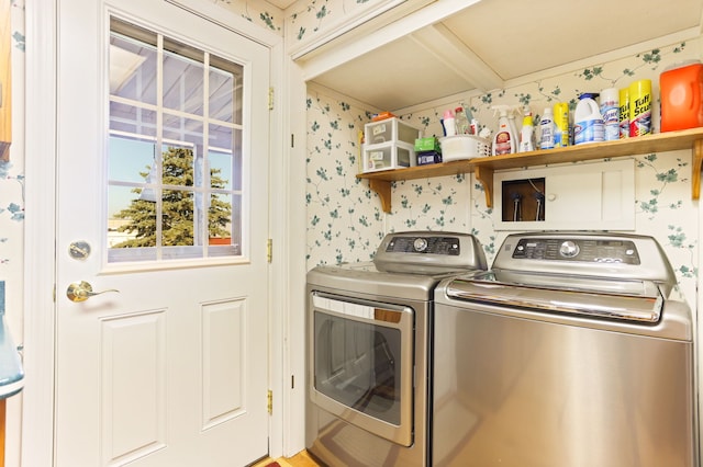 laundry area with washing machine and clothes dryer