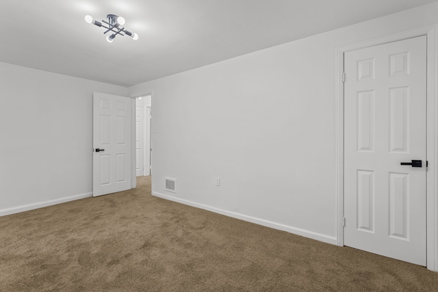 view of carpeted spare room