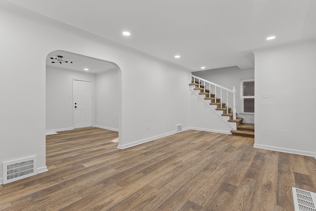 empty room featuring hardwood / wood-style floors