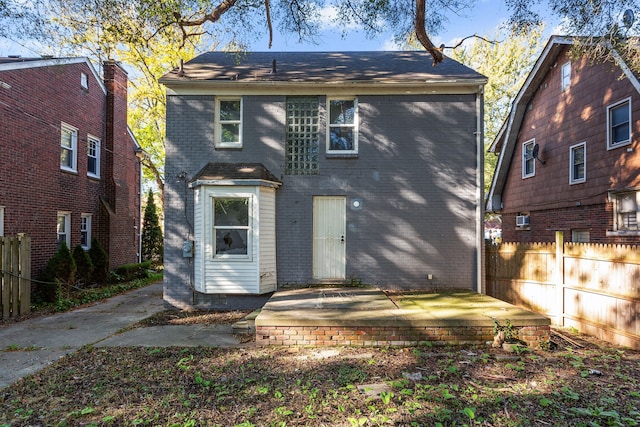 rear view of house featuring a patio area