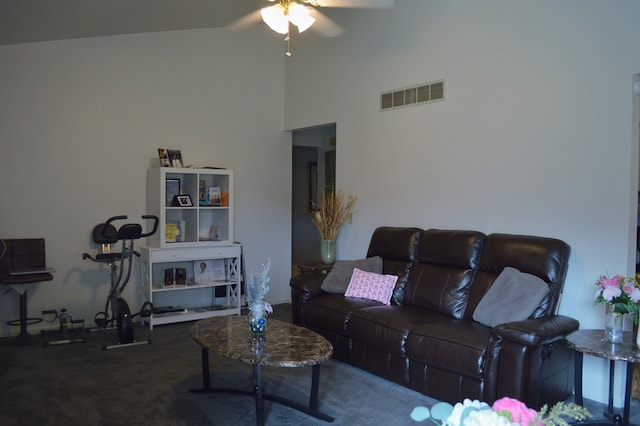 carpeted living room featuring high vaulted ceiling and ceiling fan