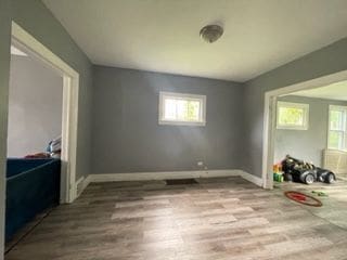 bedroom with light hardwood / wood-style floors