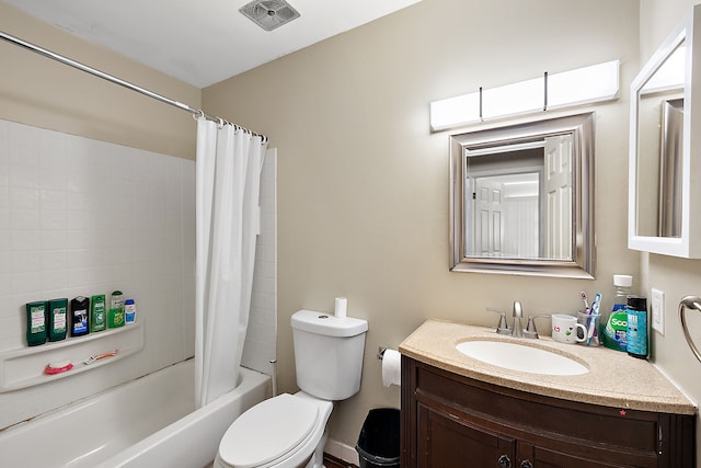 full bathroom featuring vanity, toilet, and shower / bath combo with shower curtain