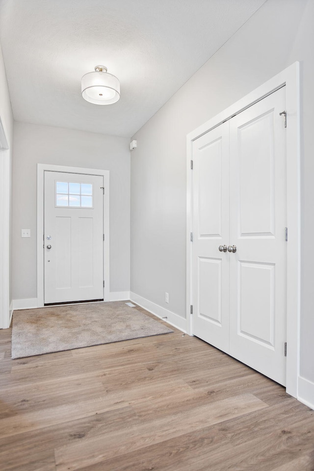 foyer featuring light hardwood / wood-style flooring