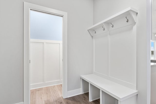 mudroom with hardwood / wood-style floors