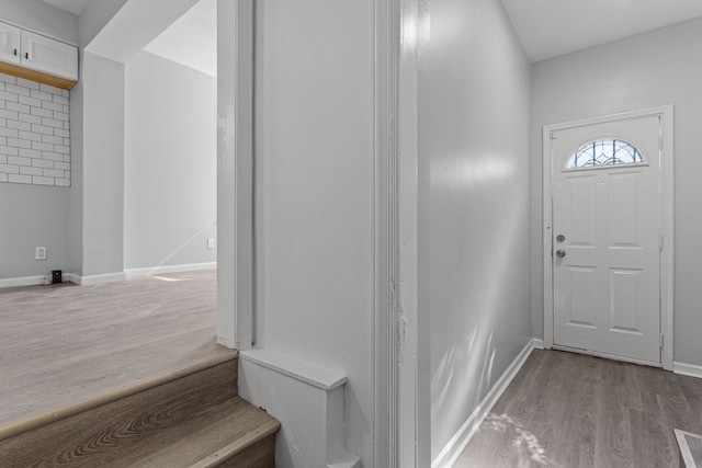 foyer with light hardwood / wood-style floors