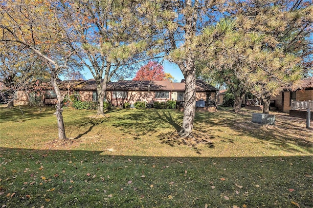 view of front of home with a front lawn