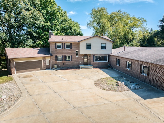 view of front of home with a garage