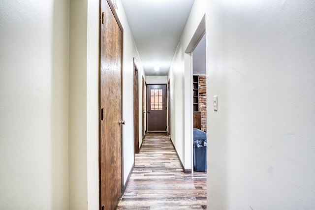 hallway featuring light hardwood / wood-style flooring