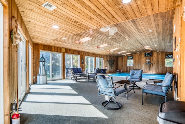 interior space with wooden ceiling and lofted ceiling