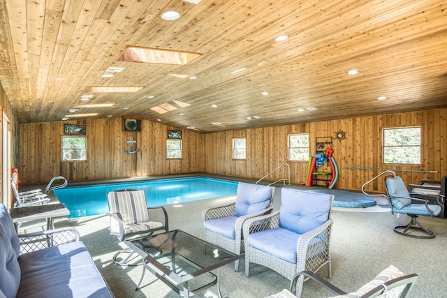 view of pool with a skylight