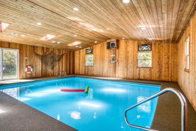 view of pool with a skylight