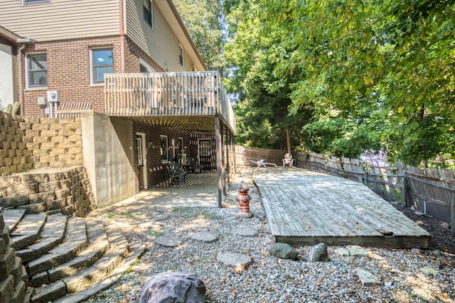 view of patio featuring a wooden deck