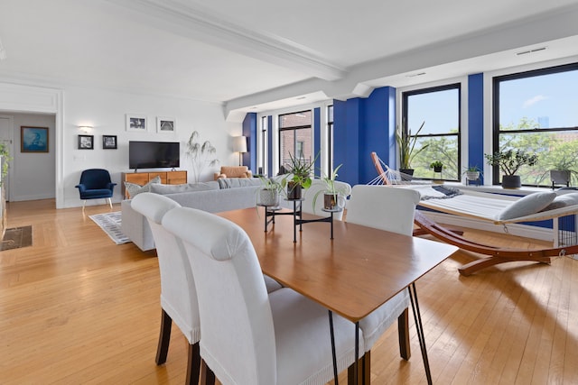 dining space featuring light hardwood / wood-style flooring