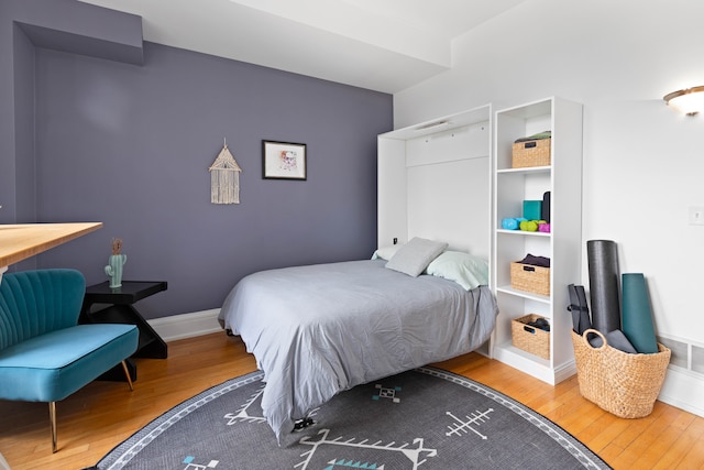 bedroom with wood-type flooring