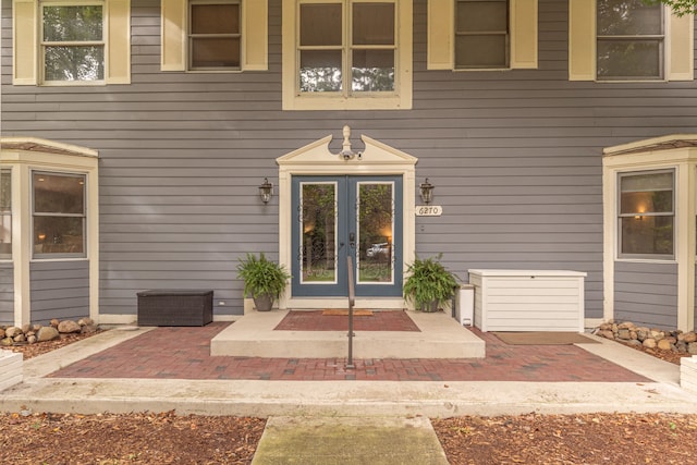 doorway to property featuring french doors