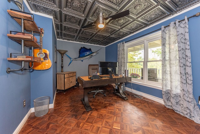 home office with an ornate ceiling and baseboards