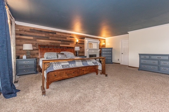 bedroom with carpet floors, baseboards, and crown molding