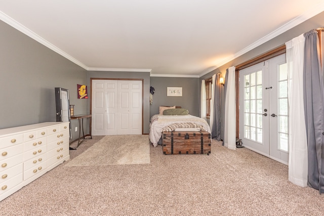 carpeted bedroom featuring french doors, crown molding, a closet, access to outside, and baseboards