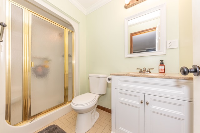 full bath with baseboards, toilet, crown molding, vanity, and a shower stall