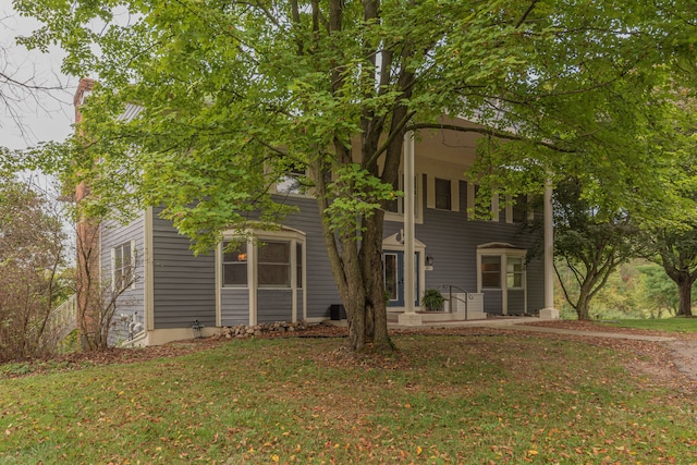 exterior space with a lawn