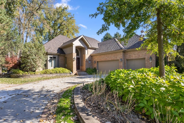 view of front of home with a garage