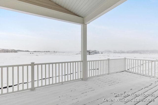 view of snow covered deck