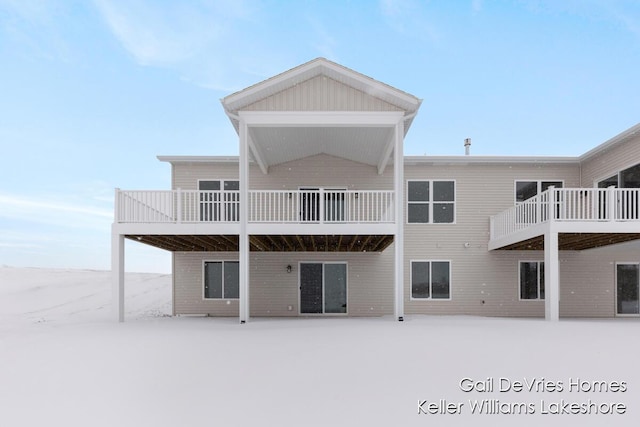 view of snow covered house